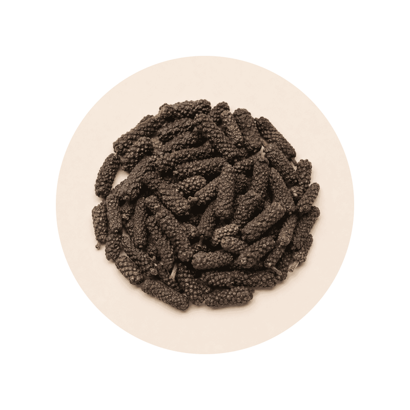 Cosmoperine (black pepper extract) close-up on a cream circular background