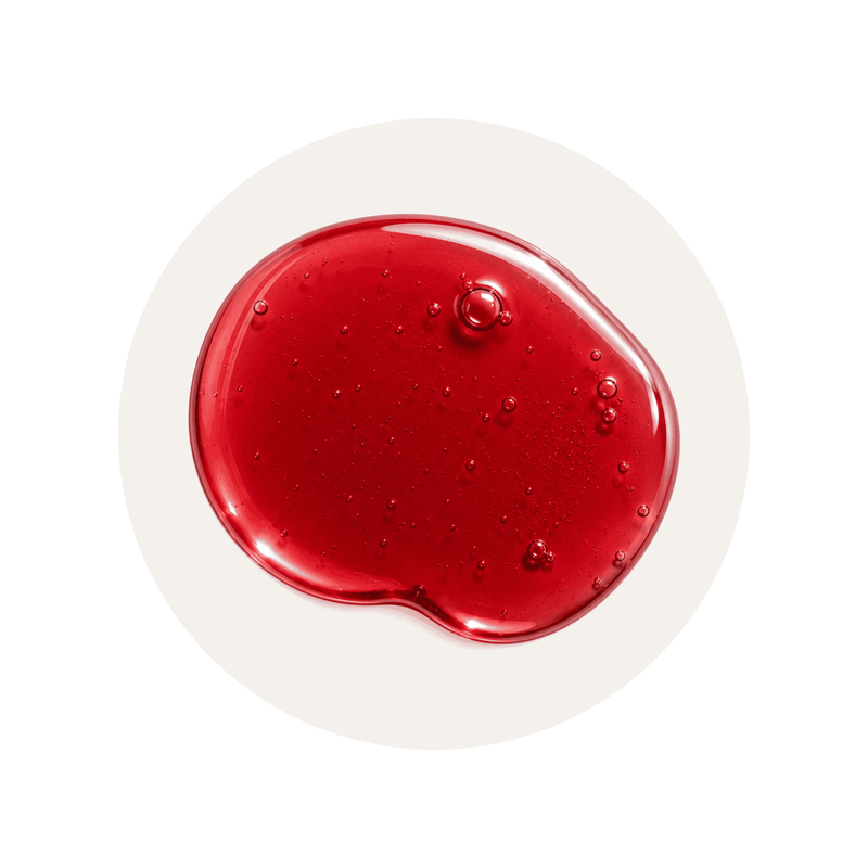 Pomegranate Extract ingredient close-up on a cream circular background