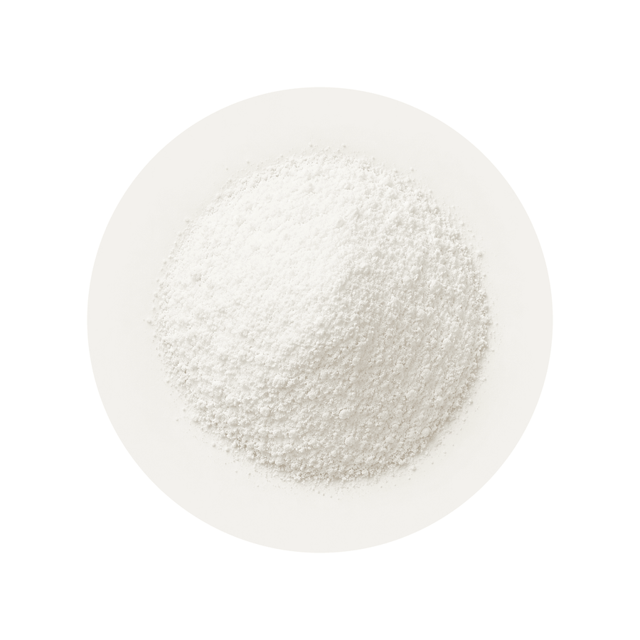 Magnesium Beta-Hydroxybutyrate ingredient close-up on a cream circular background