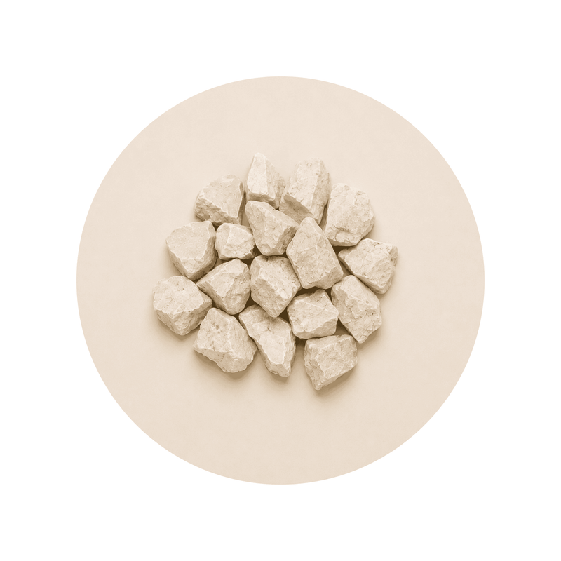 Calcium Carbonate ingredient close-up on a cream circular background