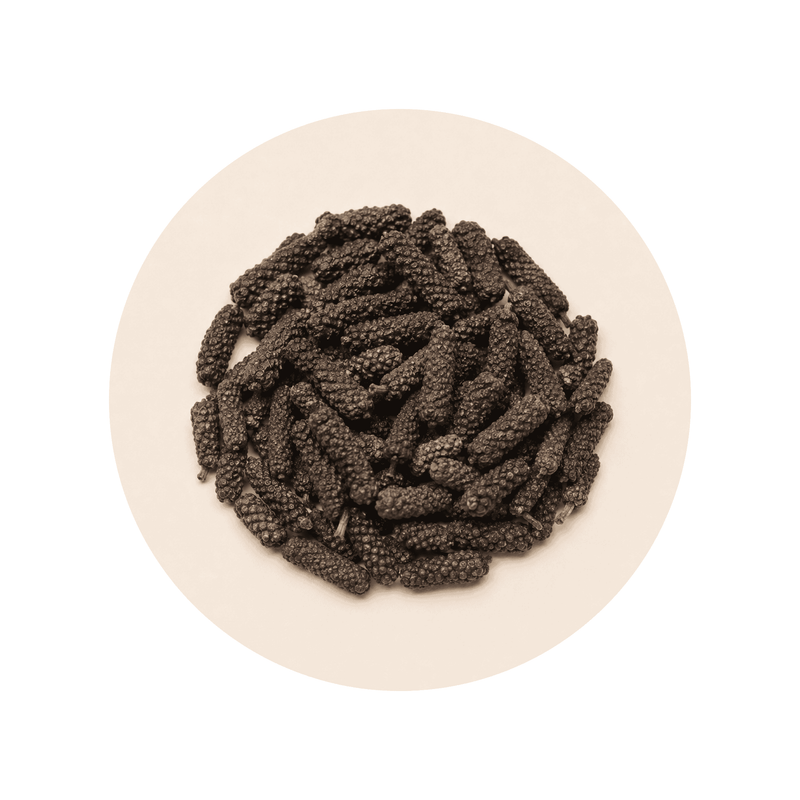 Cosmoperine (black pepper extract) close-up on a cream circular background