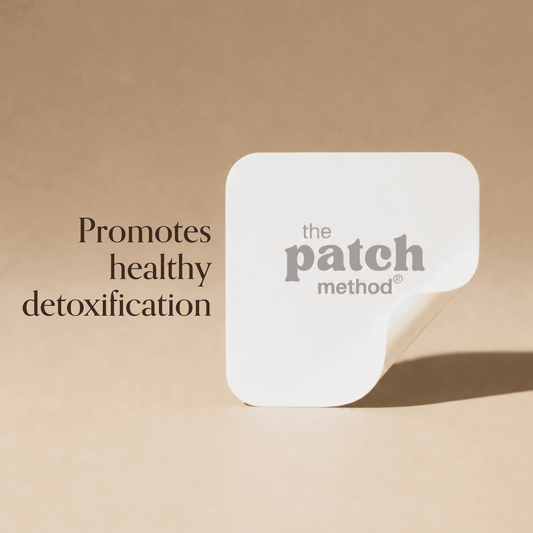Tan patch on a plain background beside the text Promotes healthy detoxification
