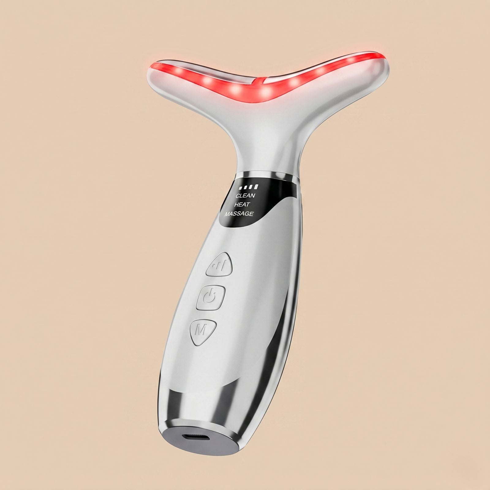 Silver electronic device with red light on a beige background